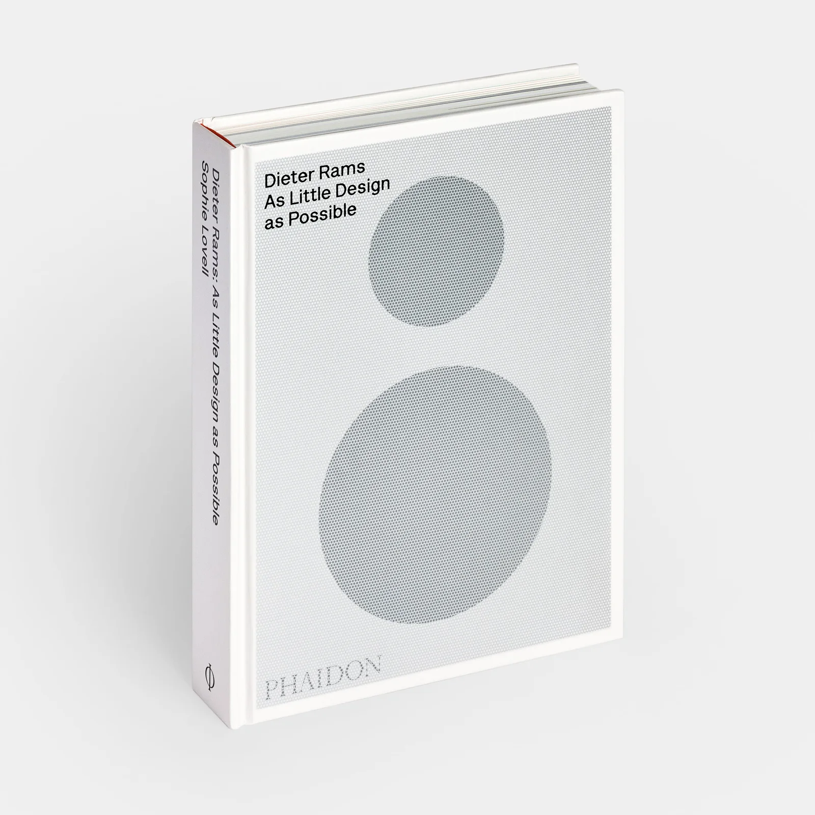 《Dieter Rams: As Little Design as Possible》2024 年版精装书立放照，浅灰封面上两个网点圆形